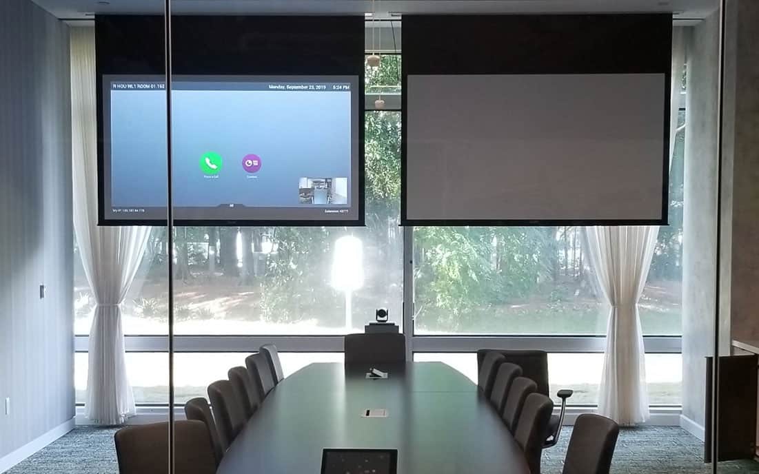 Conference room with video conference set up.