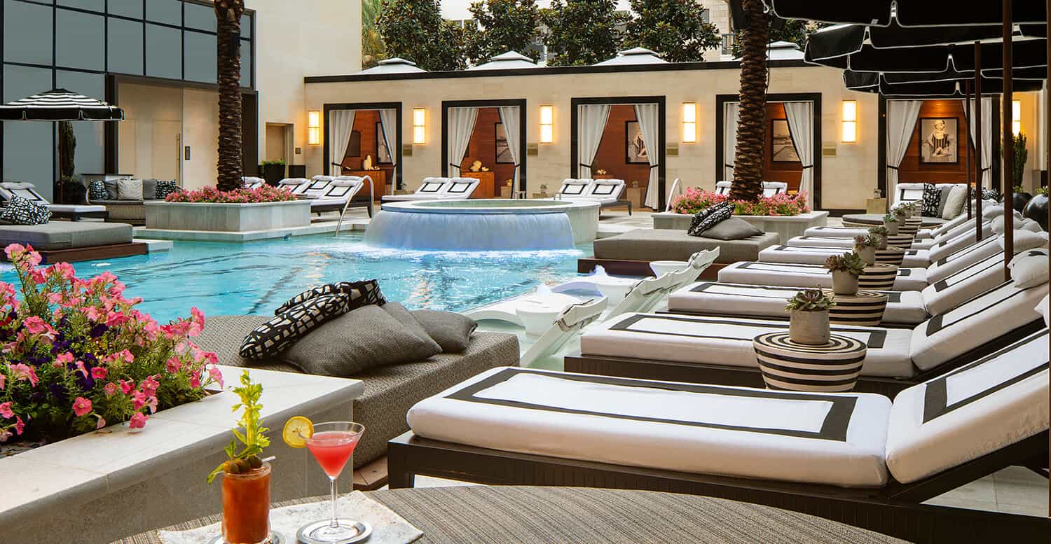 Chairs and cabanas atthe post oak hotel in houston texas.