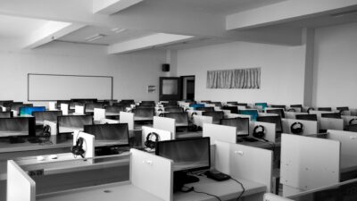 rows of cubicles with business phone system setup
