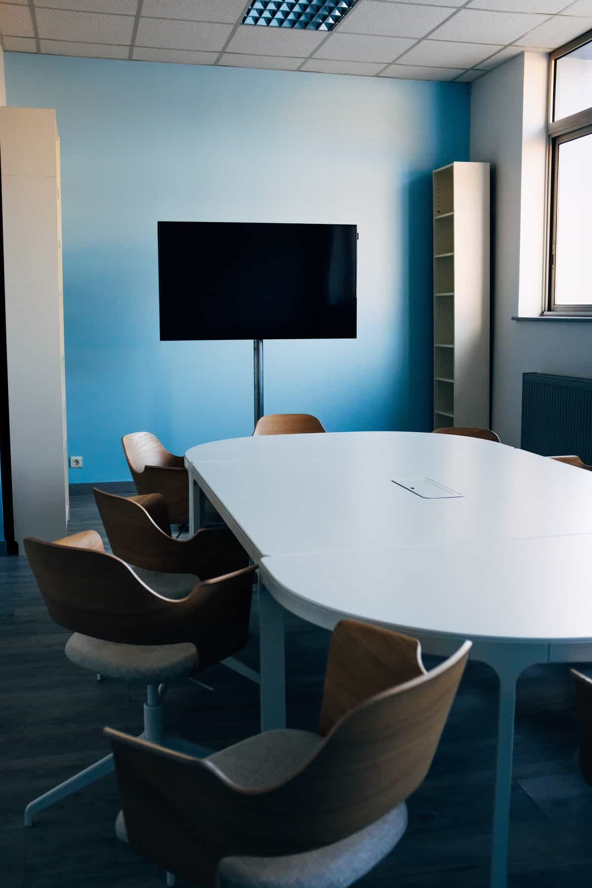 Tiny conference room with a TV.